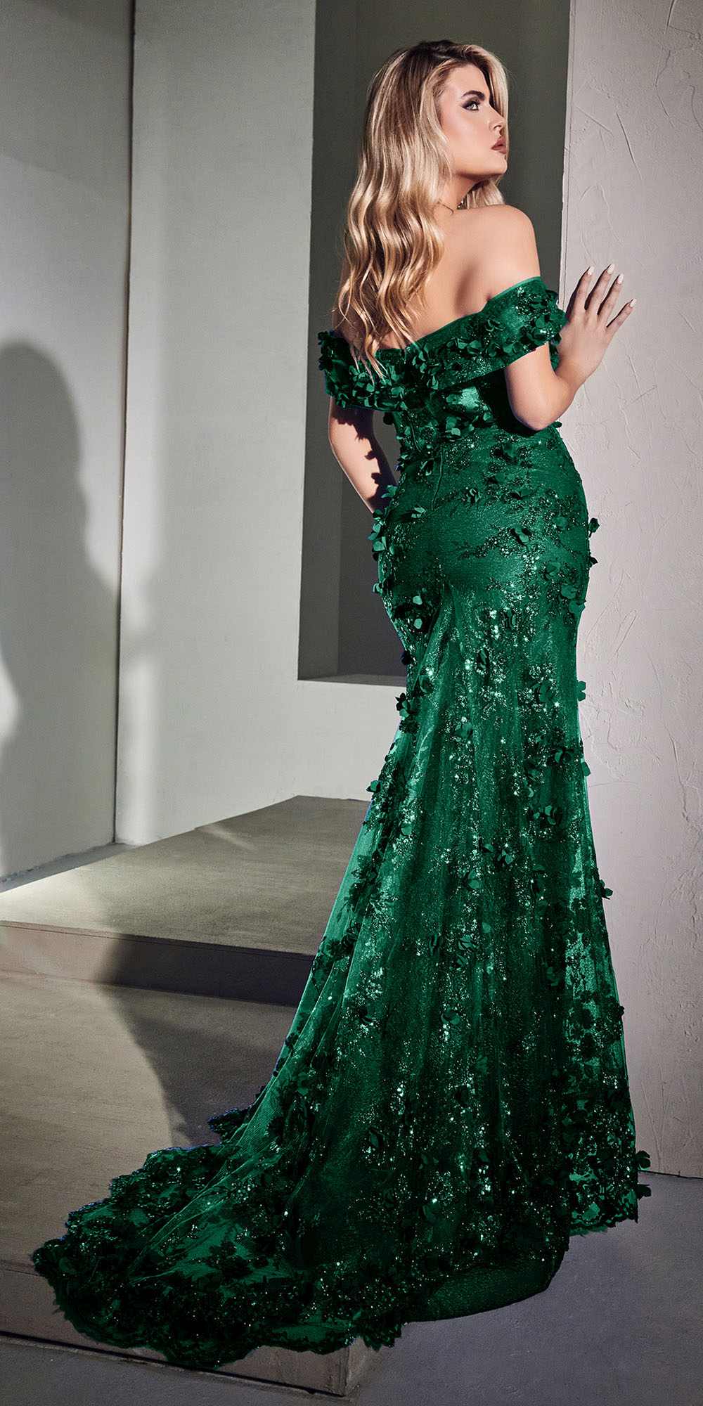 Emerald green off-the-shoulder sequin gown with 3D floral appliques and side slit