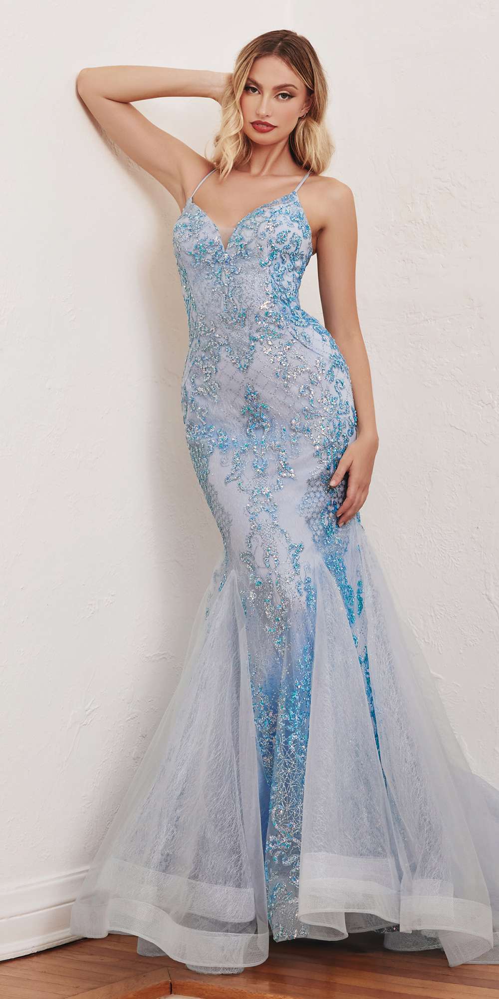 Blue mermaid glitter gown with spaghetti straps and lace-like printed detailing