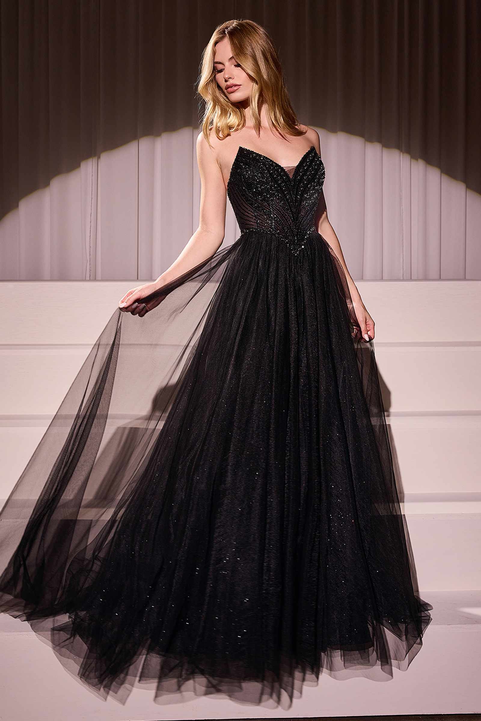 Black strapless beaded tulle ball gown with full flared skirt