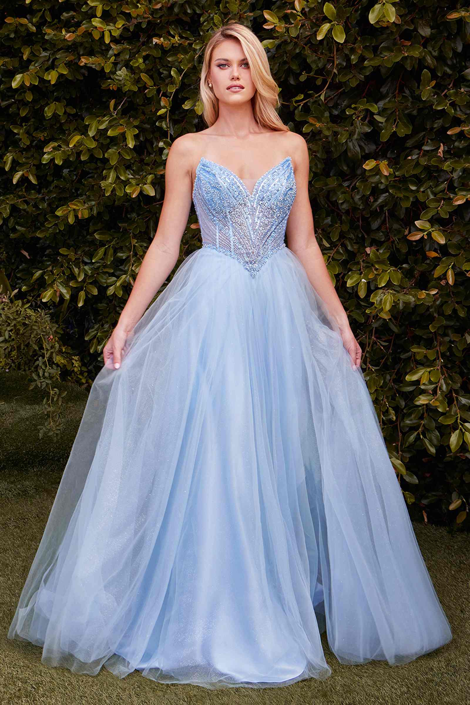 Powder blue strapless beaded tulle ball gown with voluminous skirt