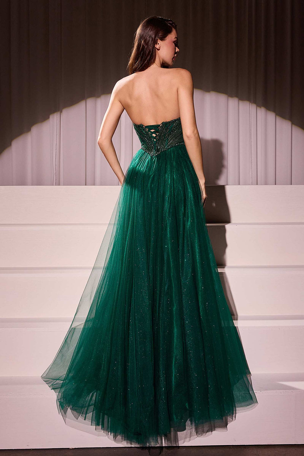 Strapless beaded tulle ball gown with teal-green sweetheart bodice, full layered skirt
