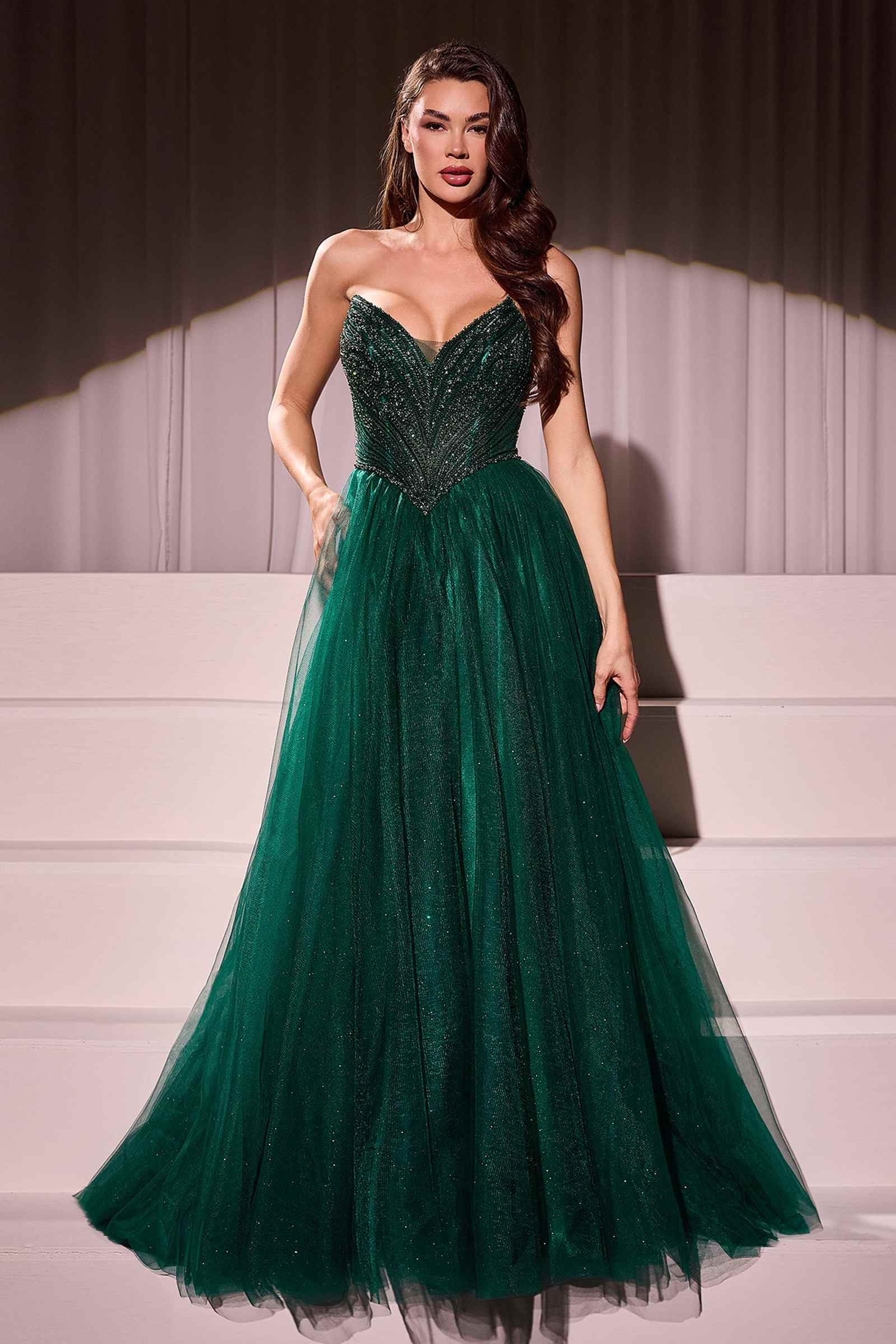 Emerald green strapless beaded tulle ball gown with full flared skirt