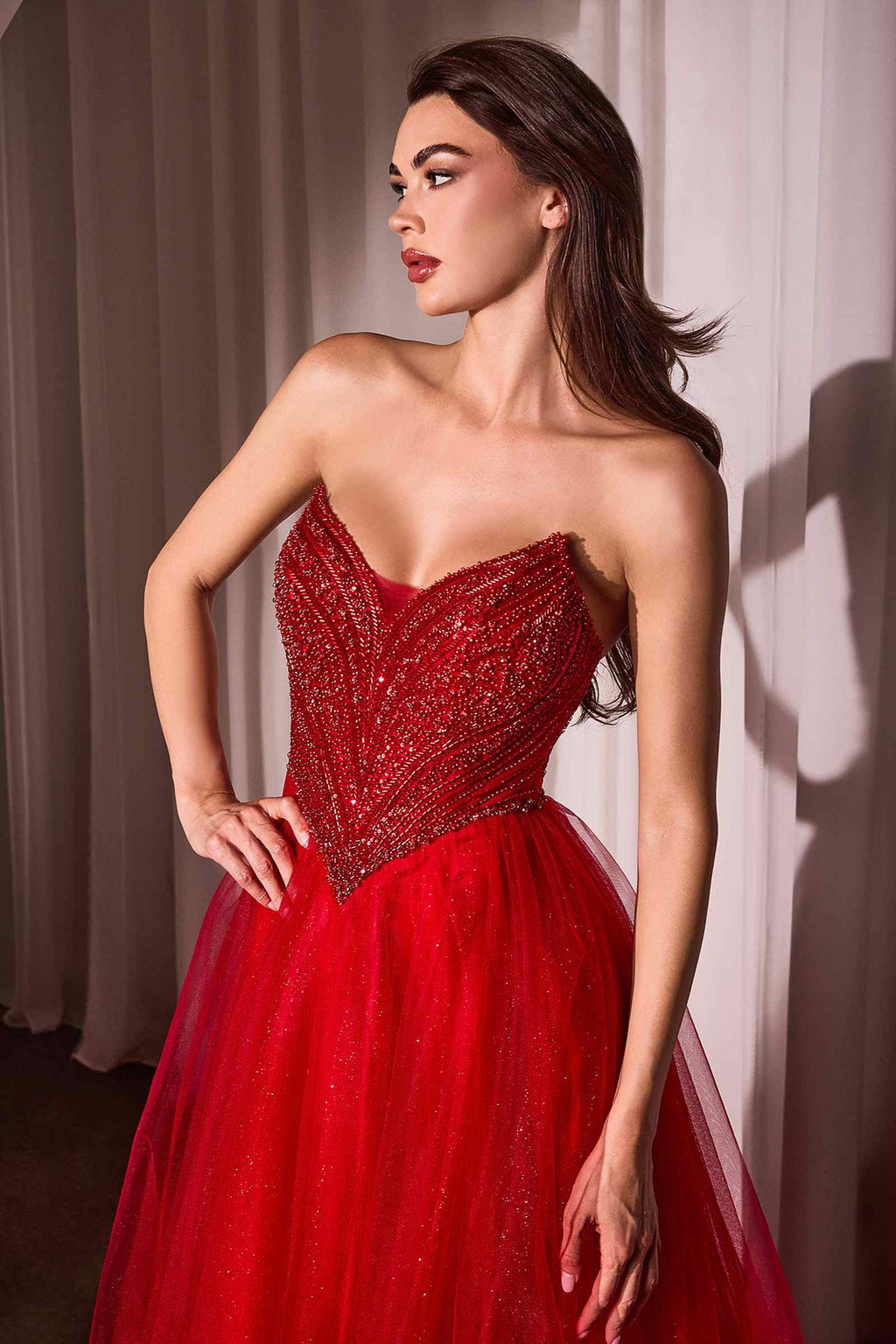 Strapless beaded tulle ball gown in red with sweetheart bodice and full voluminous skirt
