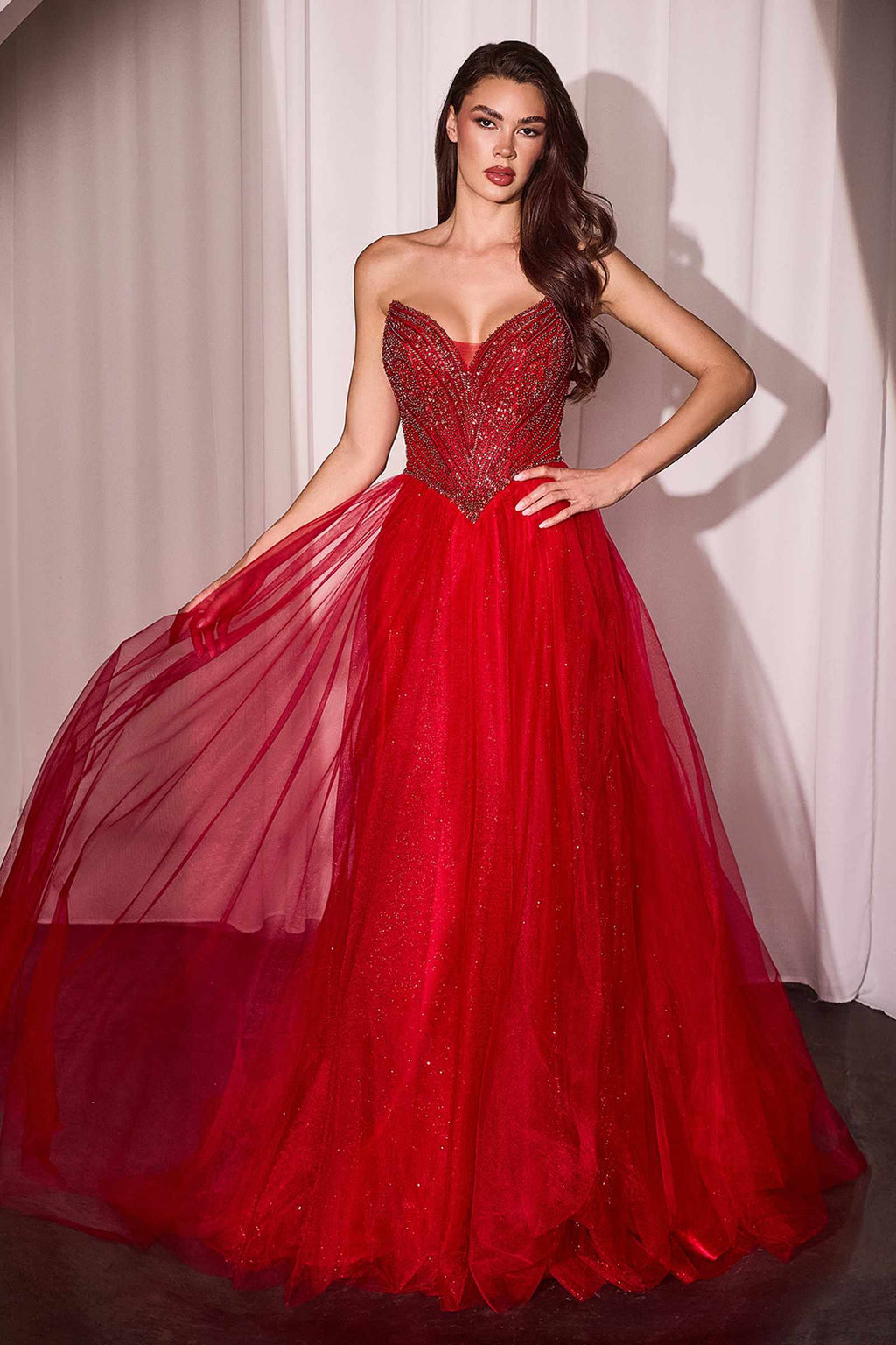 Strapless beaded tulle ball gown in red with structured sweetheart bodice and layered tulle skirt