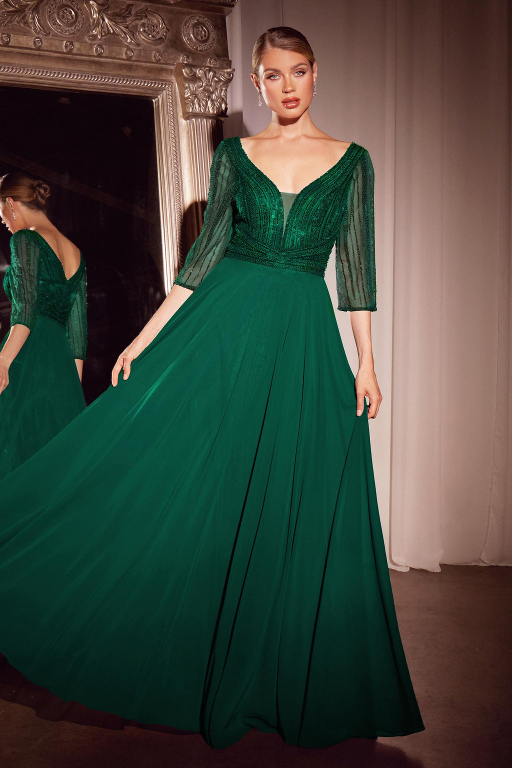 Emerald-green chiffon dress with beaded V-neck bodice, three-quarter sleeves, full skirt