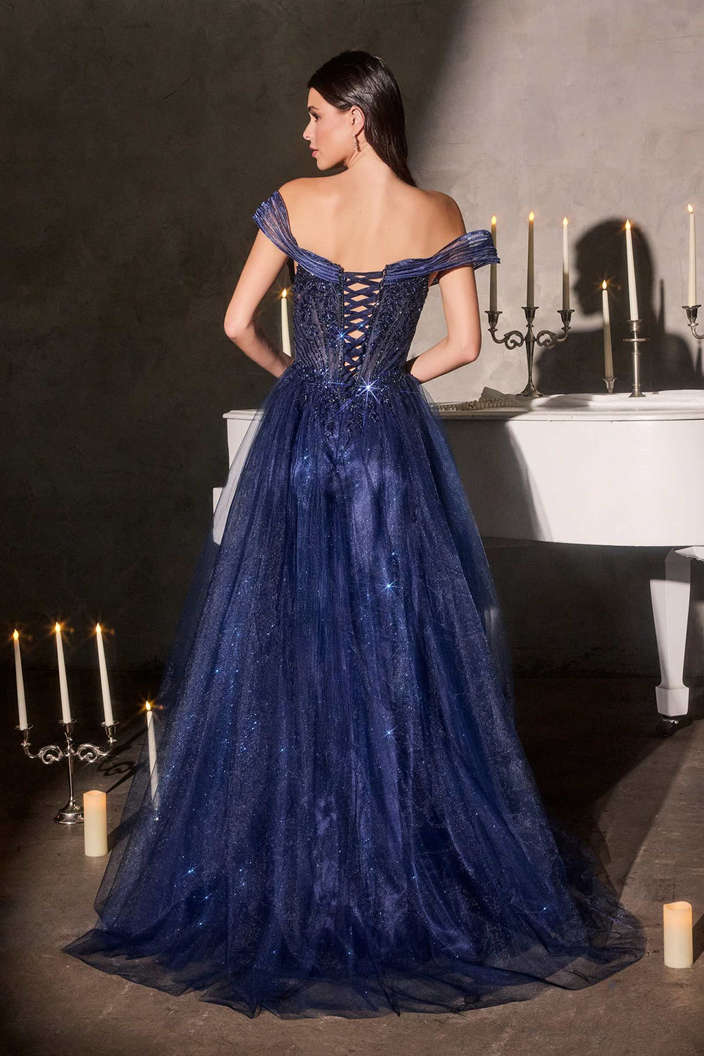 Dark blue off-shoulder tulle ball gown with lace-up corset bodice and full skirt