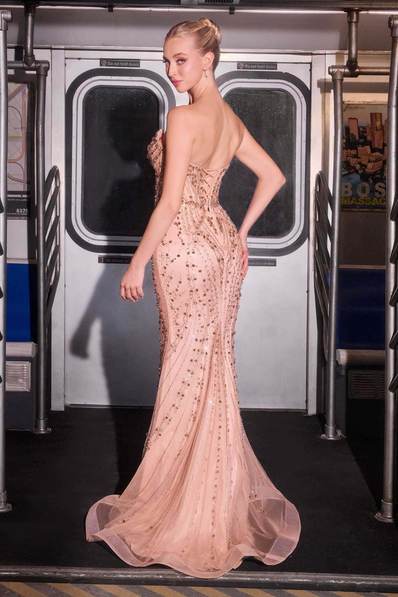 Strapless fitted mermaid gown in rose tone with sparkling crystal embellishments