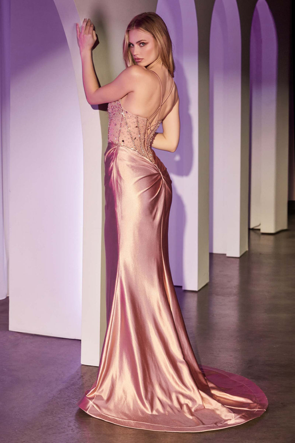 Fitted rose gold satin gown with beaded bodice and draped mermaid skirt