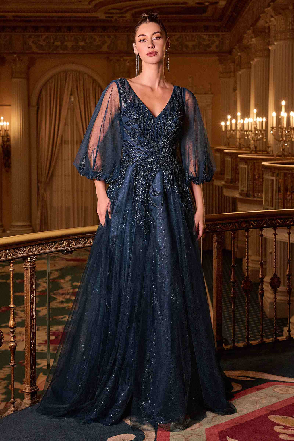 Navy blue V-neck A-line gown with layered tulle skirt and sheer long sleeves