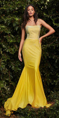 Long fitted formal dress in yellow with rhinestone detailing and mermaid skirt