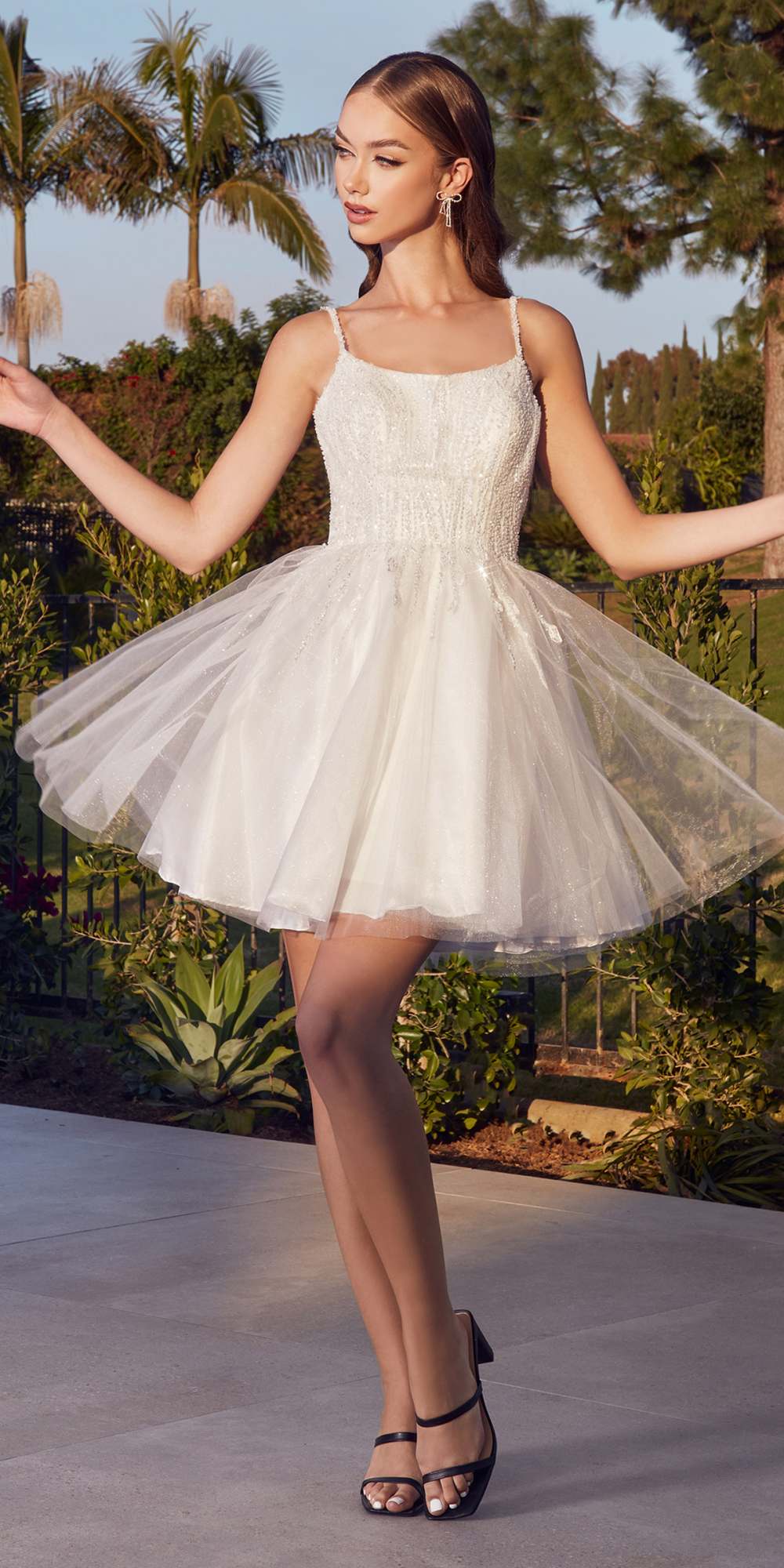 Layered tulle A-line short dress in white with spaghetti straps and full tulle skirt