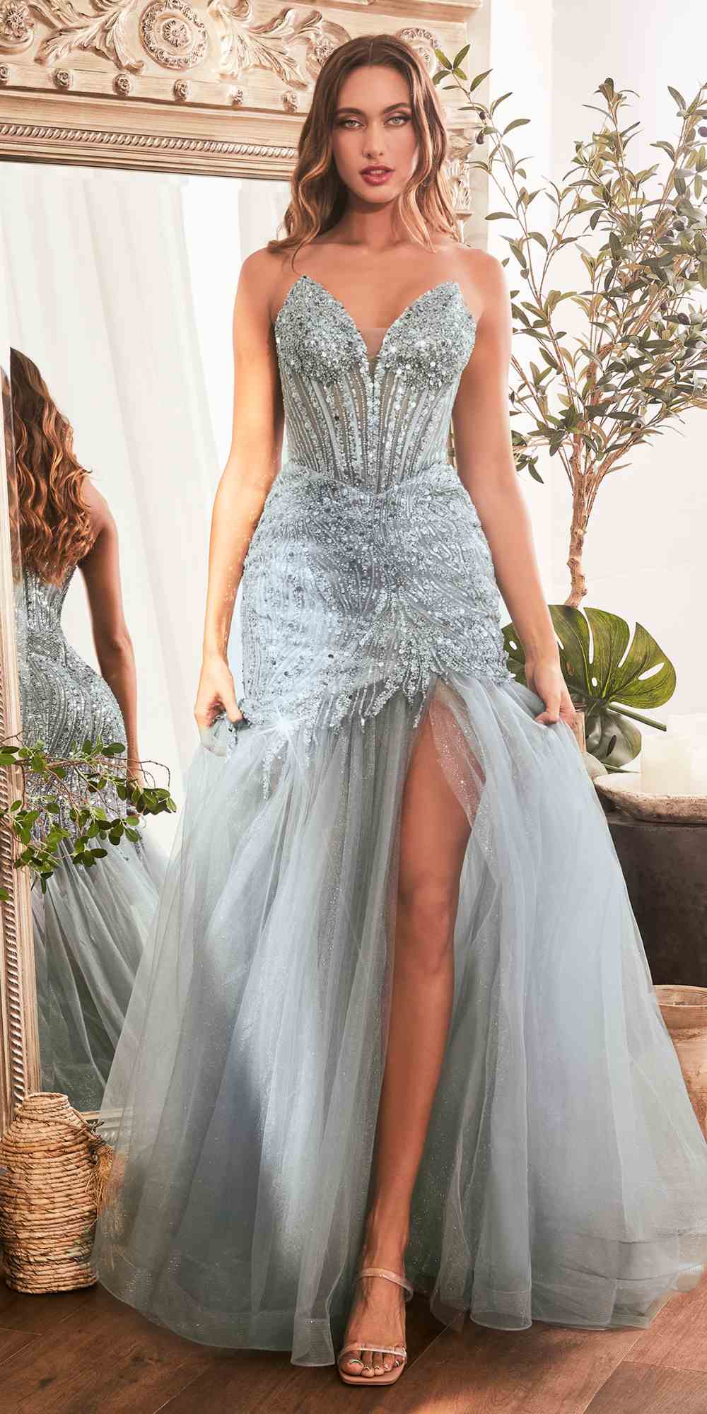 Silver-blue strapless mermaid gown with beaded corset bodice and thigh-high slit