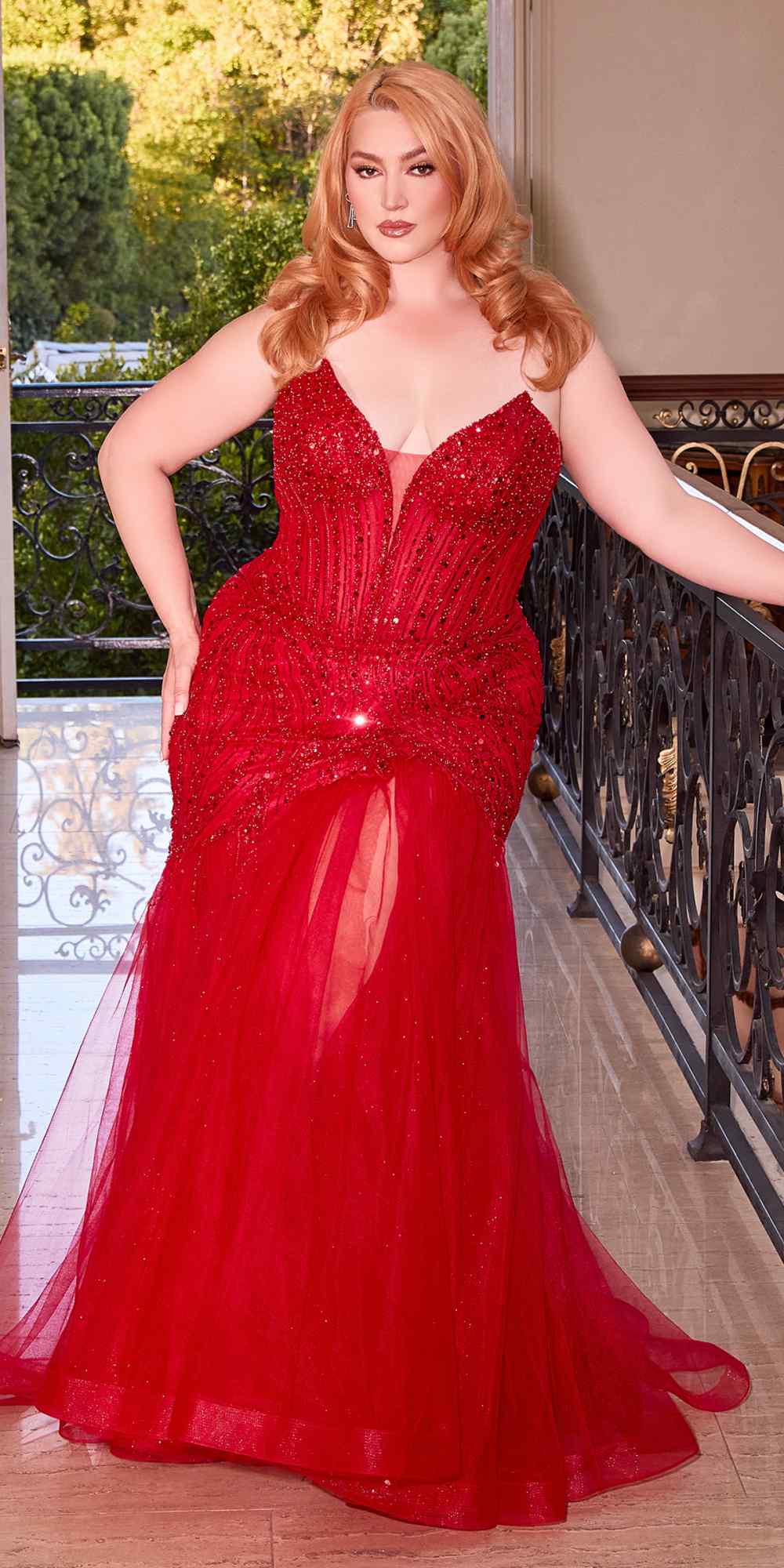Strapless mermaid dress in red with beaded pointed cups and shimmering corset