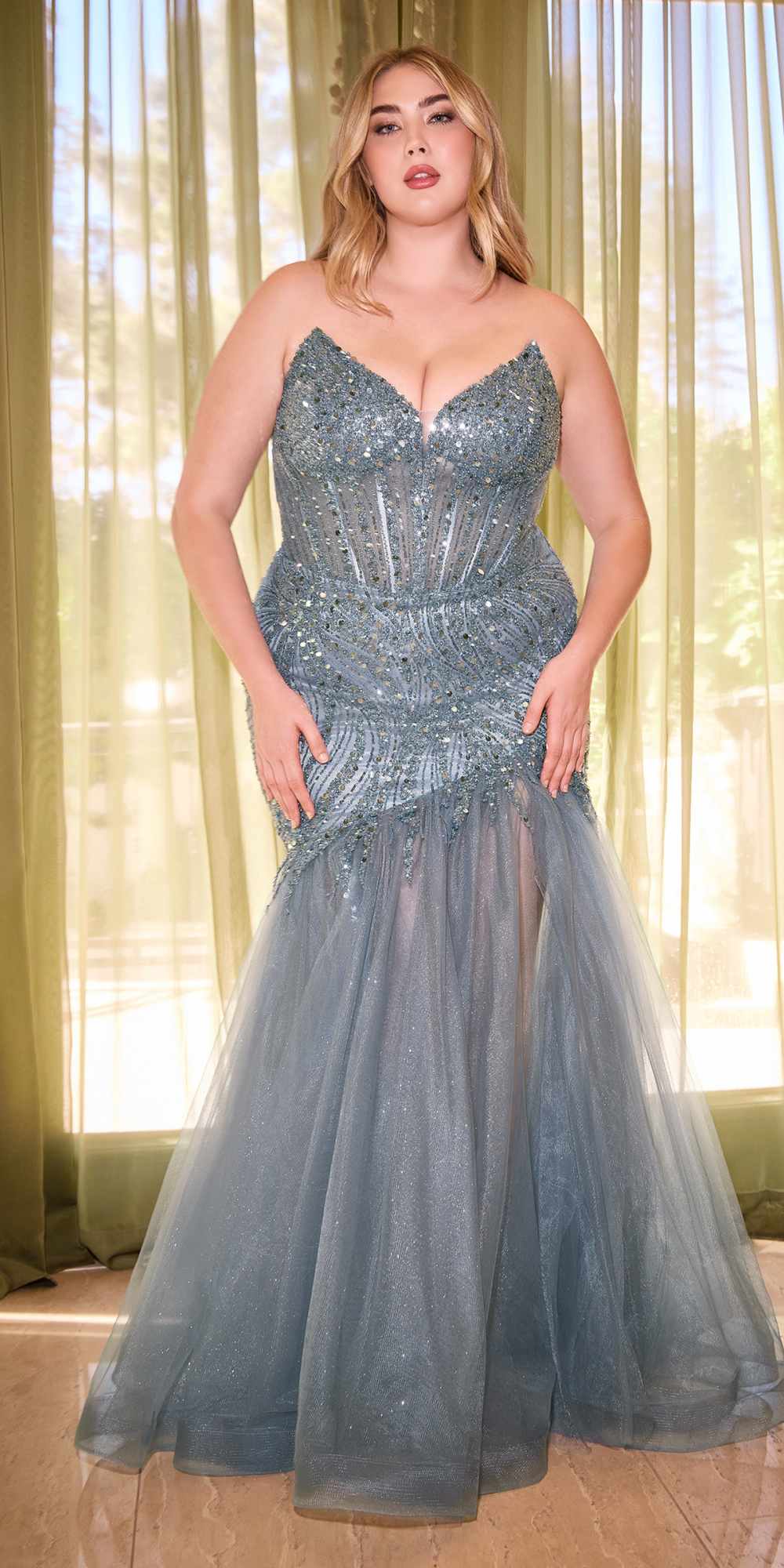 Light blue strapless mermaid dress with beaded V neckline and flowing tulle skirt