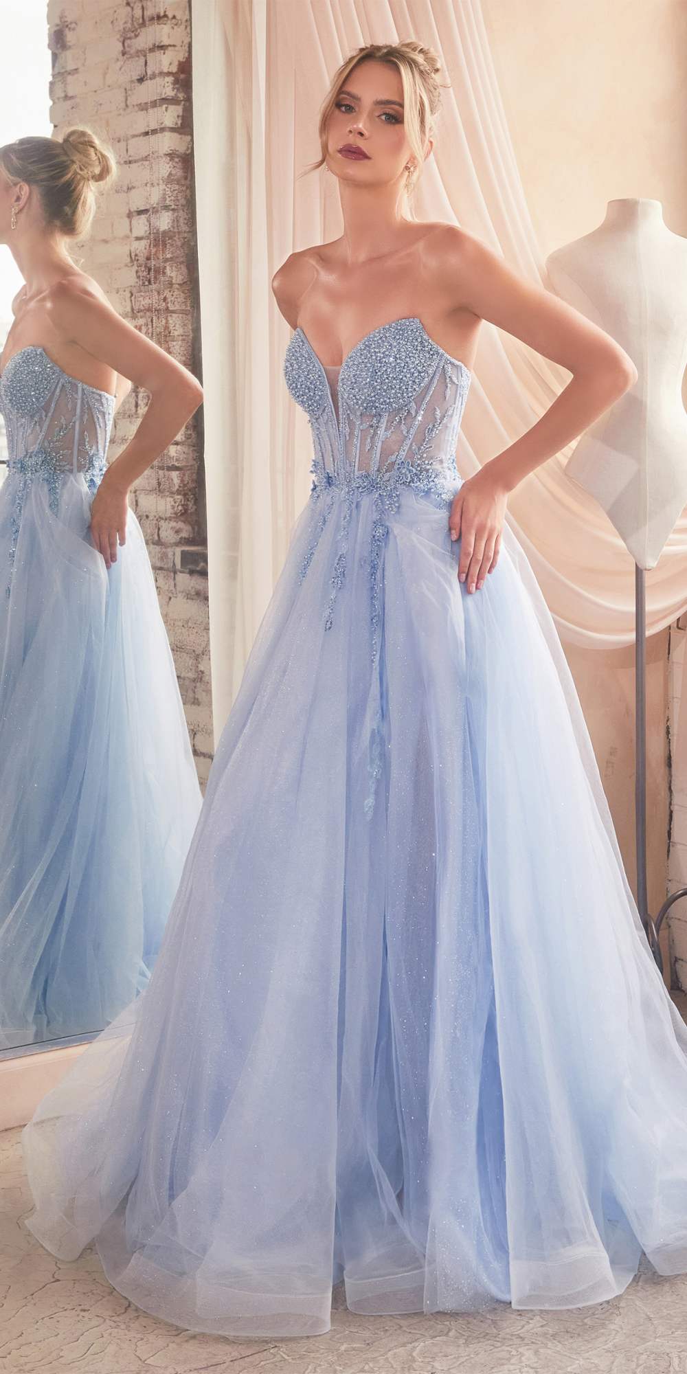 Light blue strapless tulle gown with sparkling corset bodice and full skirt