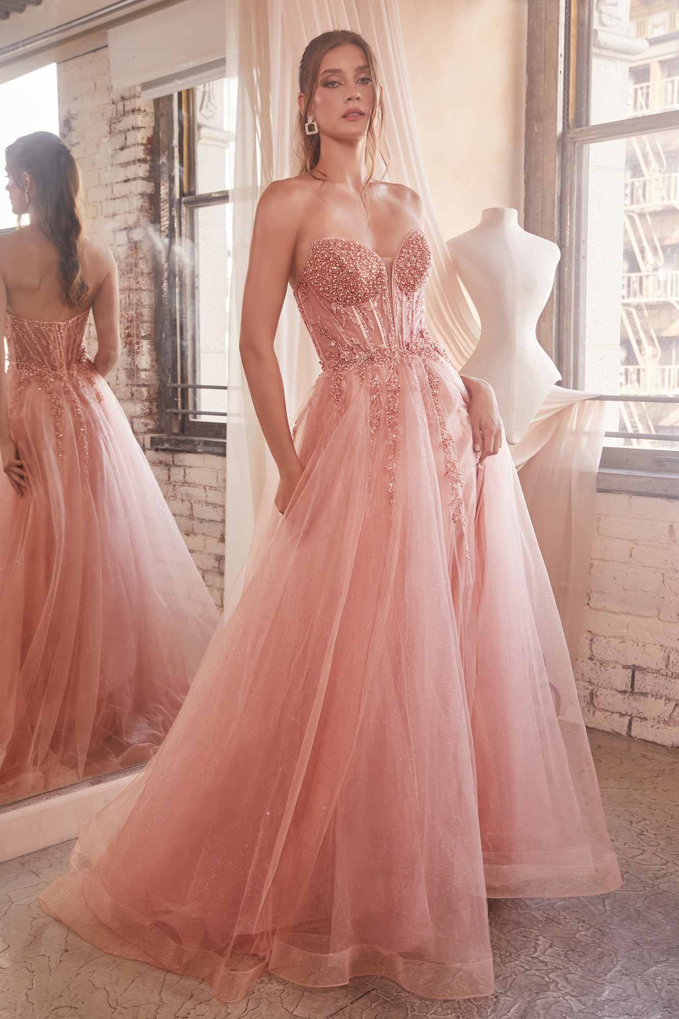 Rose pink strapless tulle corset gown with sparkling bodice and full skirt