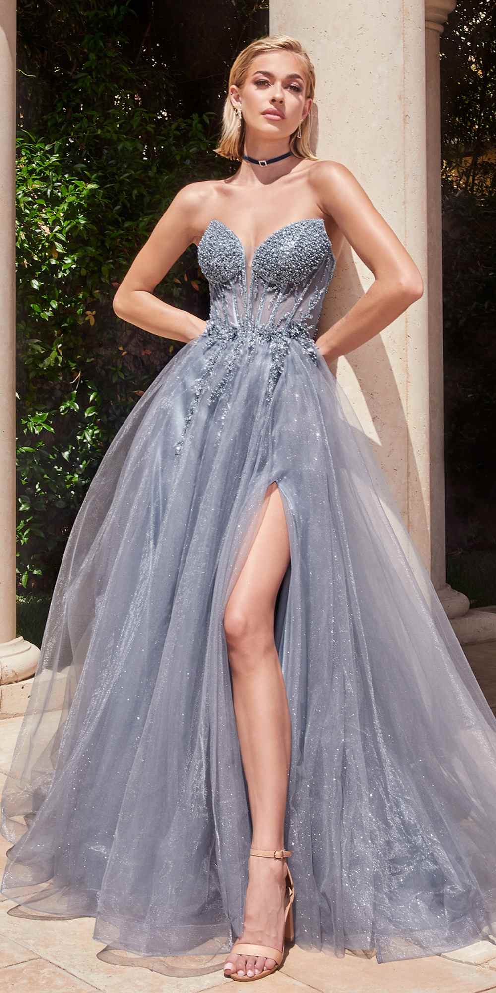 Light blue strapless tulle corset gown with sparkling bodice and thigh-high slit