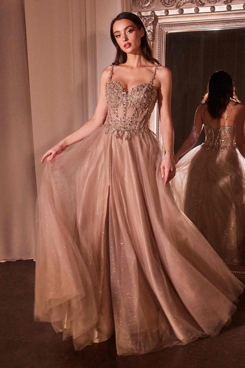 Long A-line ball gown with lace beaded bodice, spaghetti straps, and gold tulle skirt
