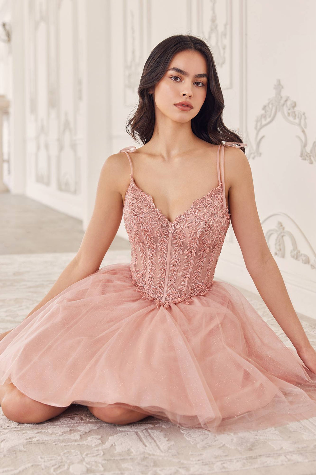 A-line homecoming dress in blush pink with corset bodice and tulle skirt