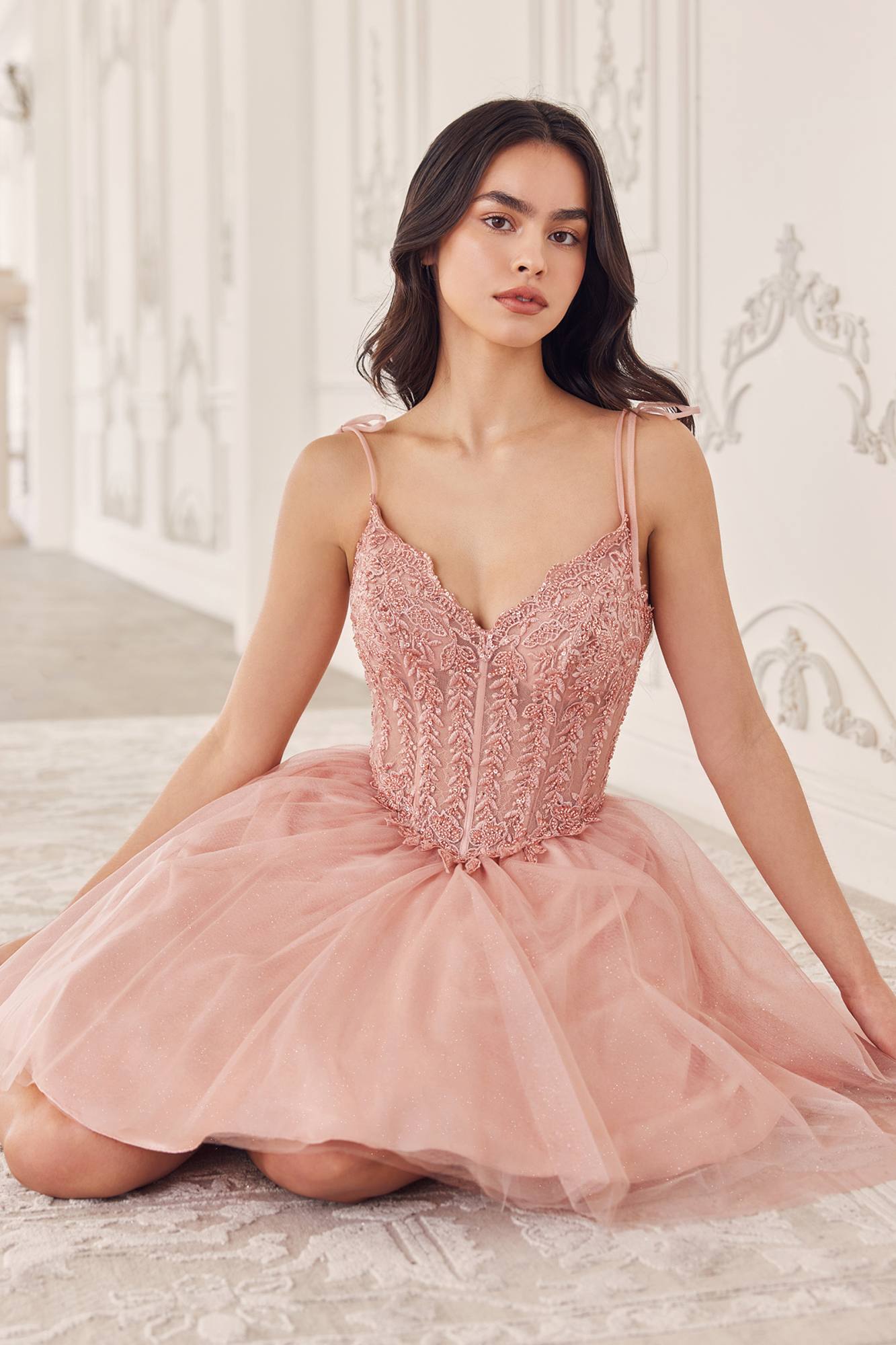 A-line homecoming dress in blush pink with corset bodice and tulle skirt