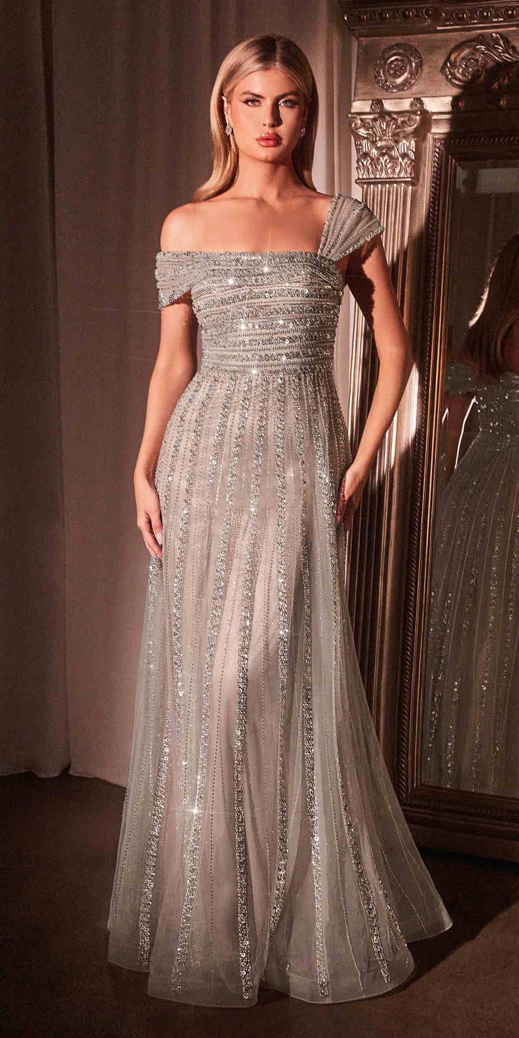 Nude off-shoulder beaded A-line gown with fitted bodice and full skirt
