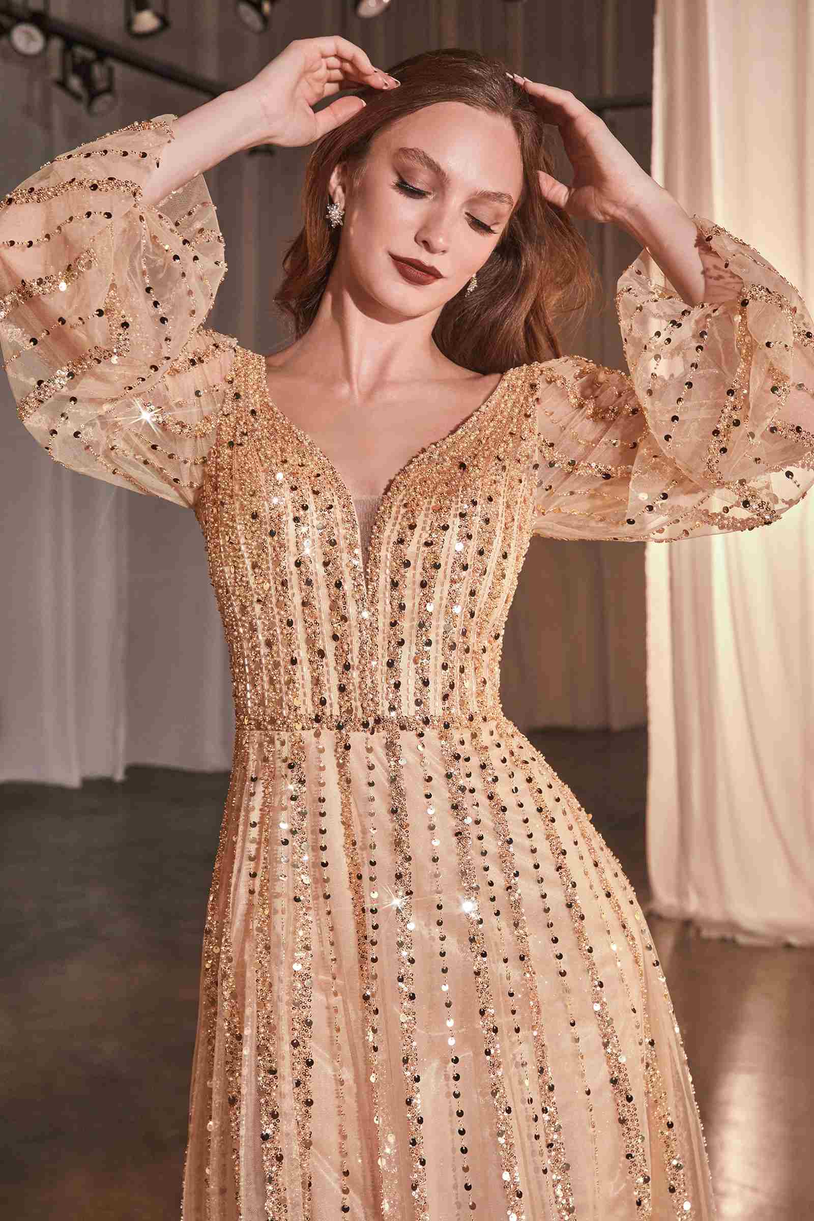 Champagne gold V-neck long-sleeve sequin beaded gown with gathered waist detail