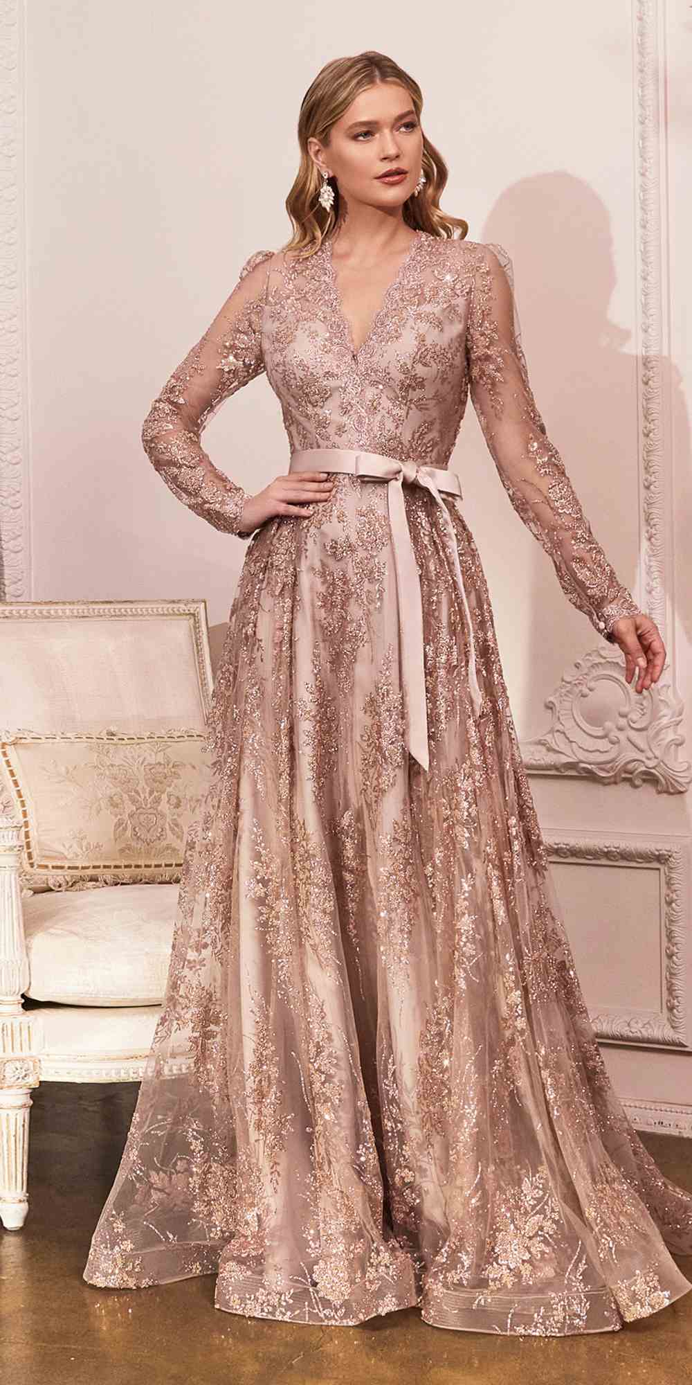 Champagne gold long-sleeve embellished ball gown with V-neck, lace detailing, waist tie