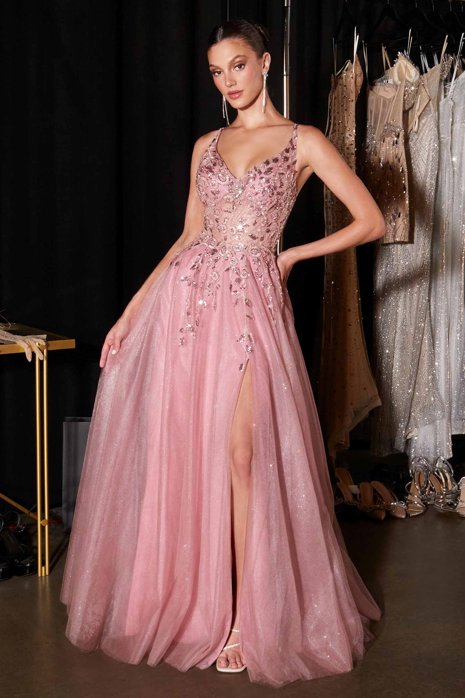 Mauve glitter tulle A-line gown with V-neck, floral appliques, and deep front slit