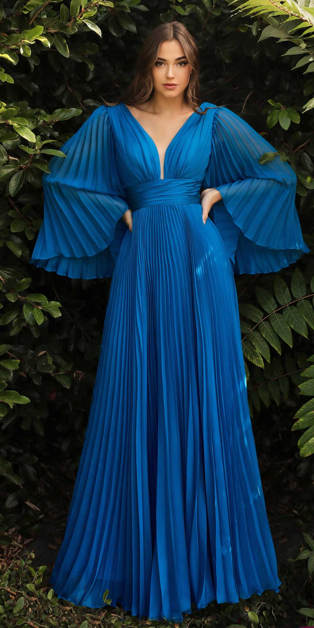 Royal blue pleated chiffon long sleeve gown with V-neck and flared cuffs