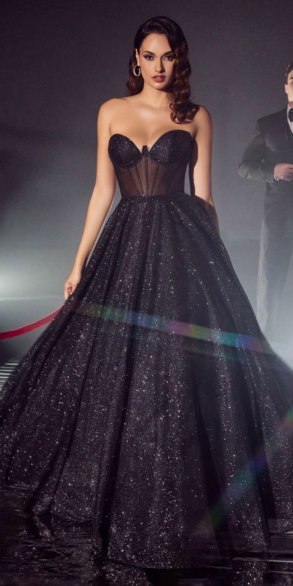 Black glitter strapless corset ball gown with full A-line tulle skirt