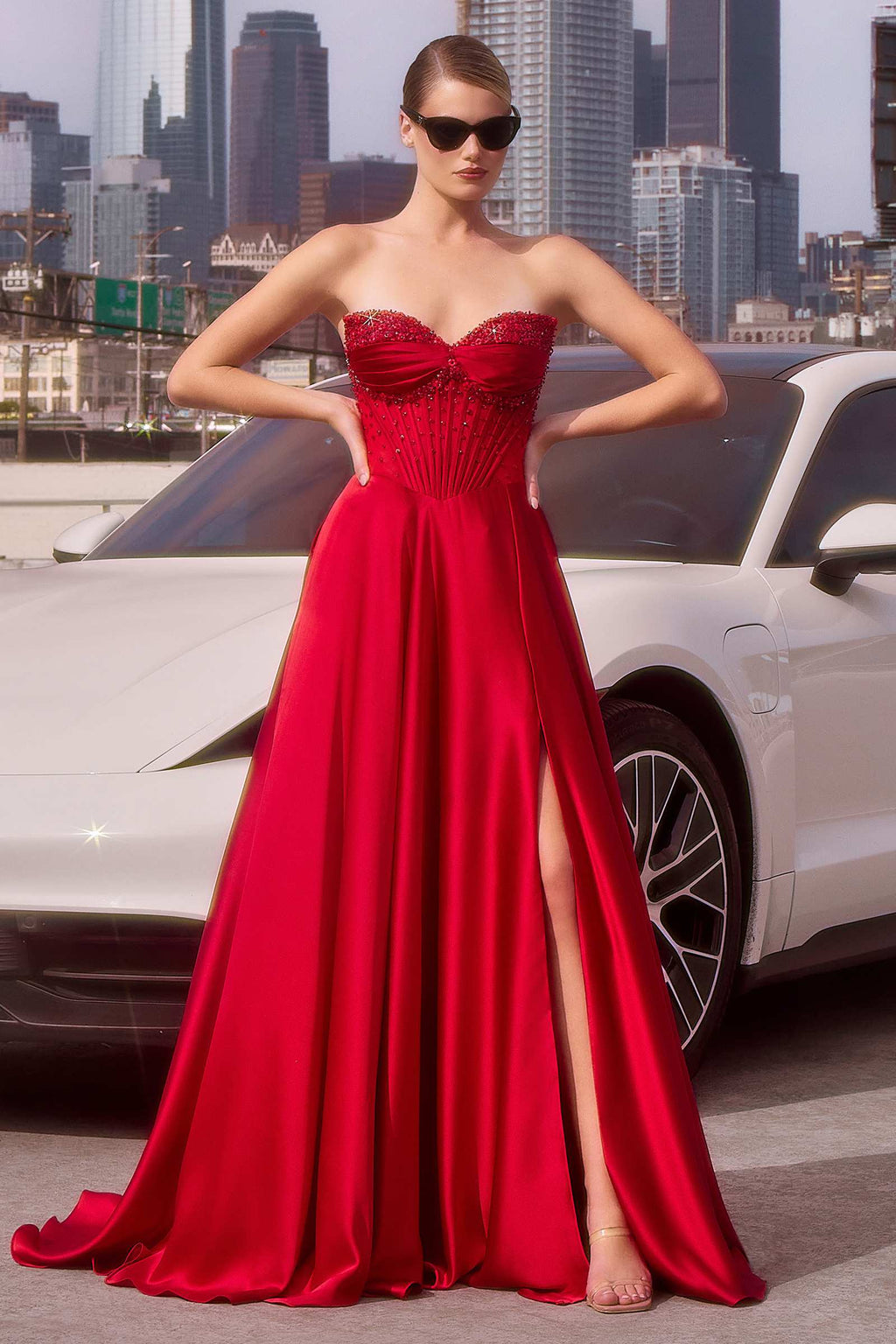 Beaded satin A-line prom dress, strapless sweetheart neckline, red with side slit.