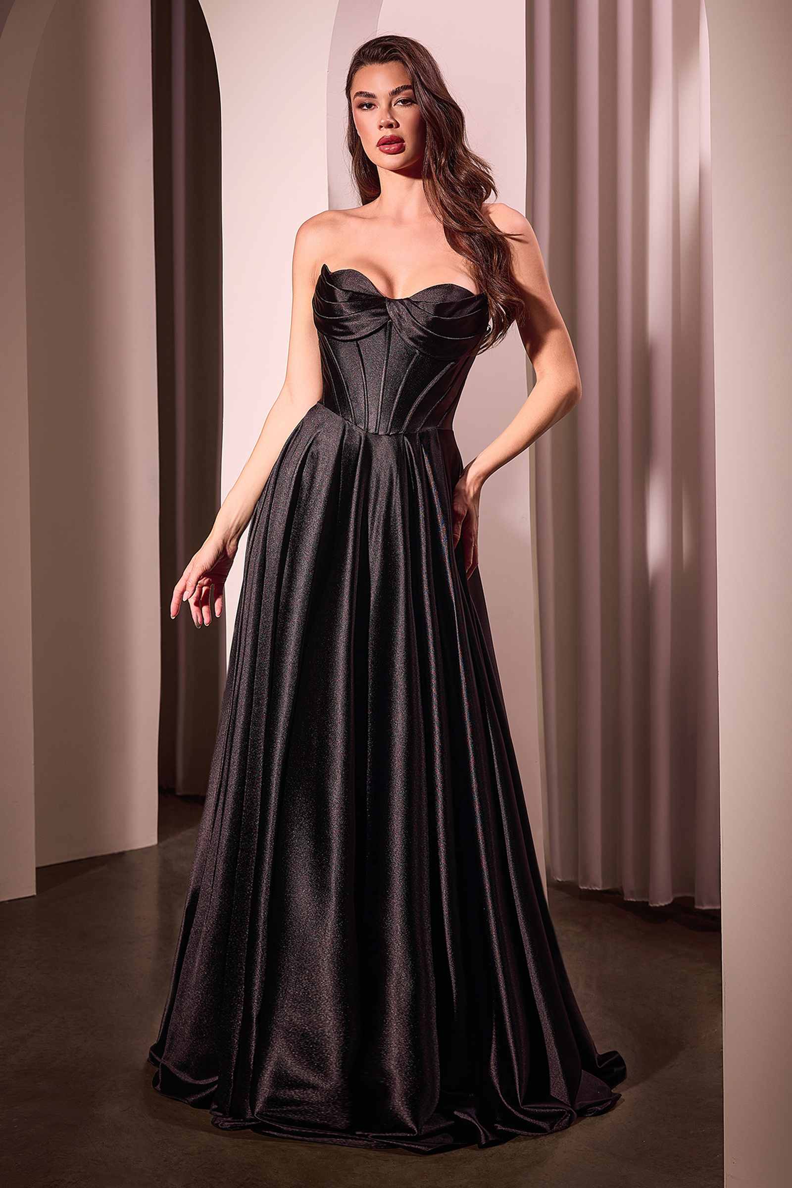 Black strapless satin A-line gown with sweetheart neckline and gathered skirt