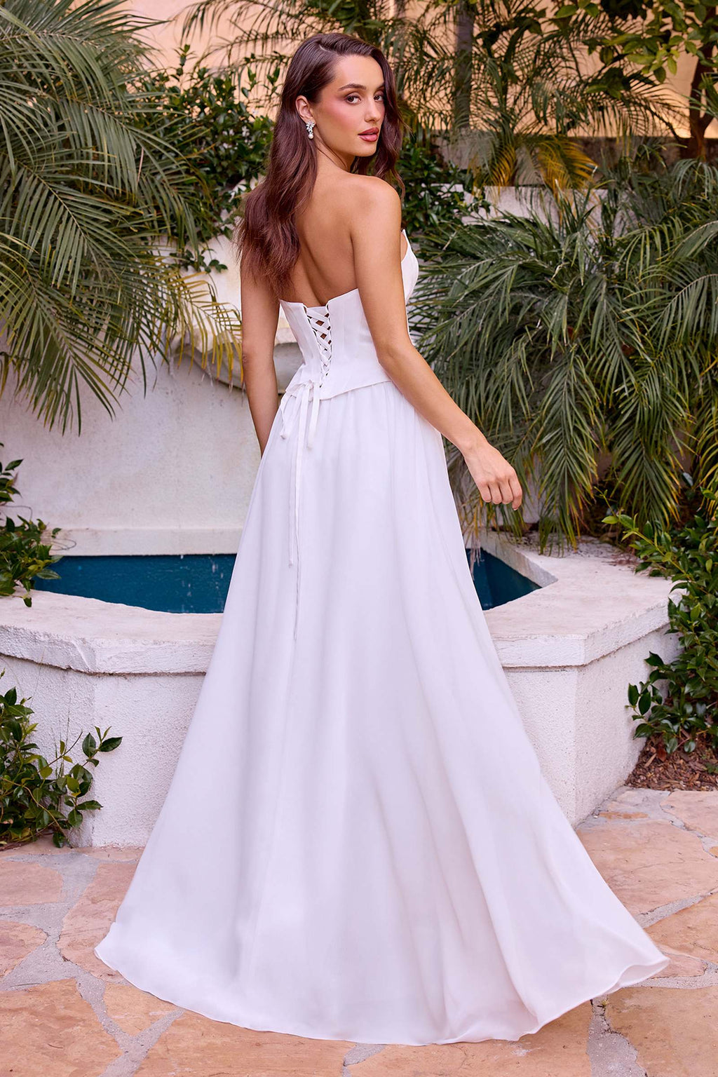 Backless off-white strapless A-line bridal gown with flowing chiffon skirt