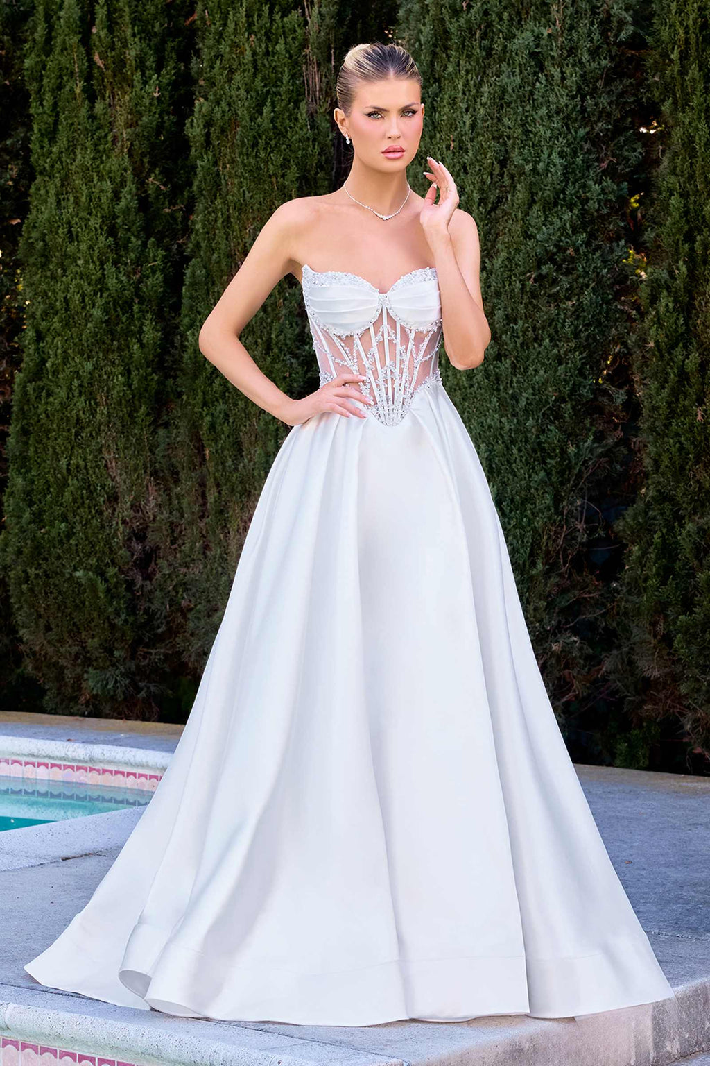 Off white A-line bridal gown with sweetheart corset bodice and lace bead fringe
