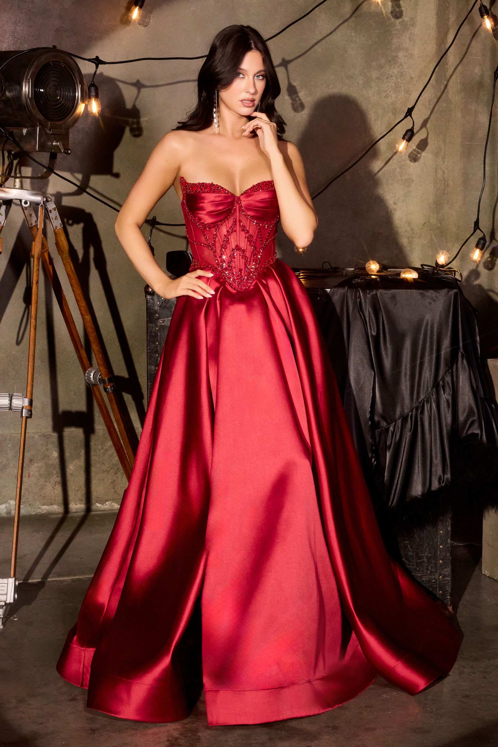 Burgundy strapless A-line formal dress with corset-style bodice and full skirt