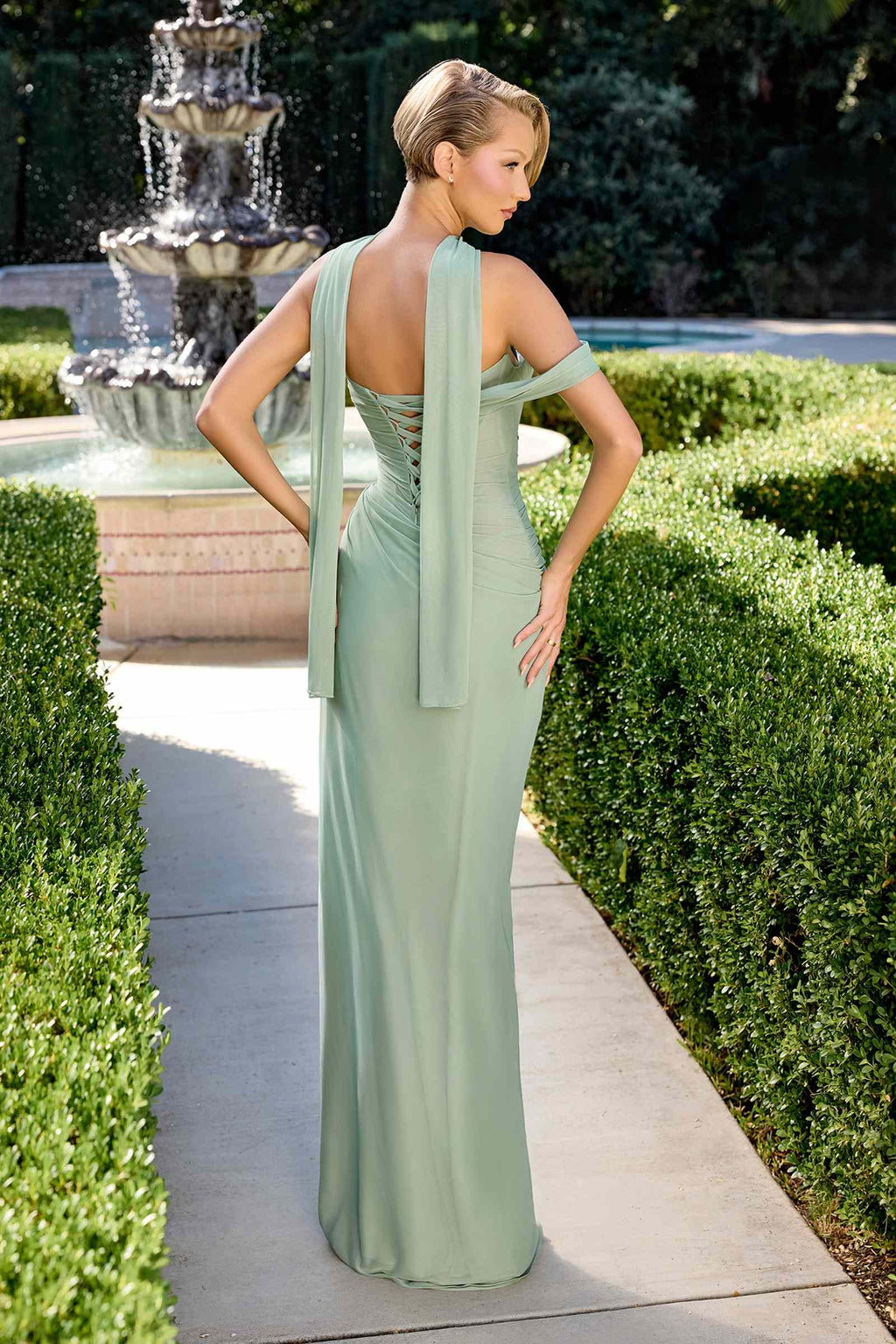 Sculpted pleated chiffon fitted gown with open back drape and side slit, sage green