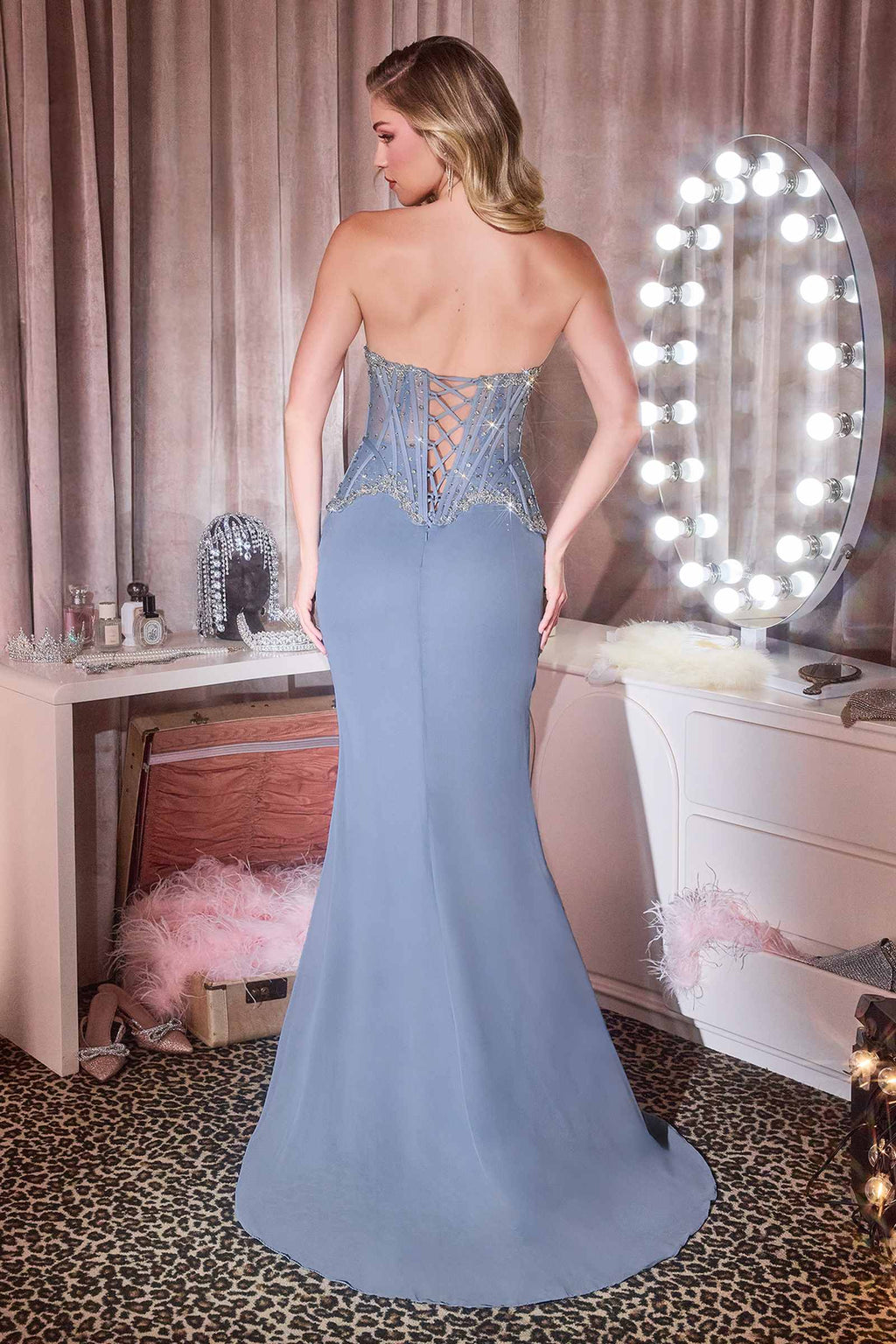 Fitted chiffon gown in smoky blue with beaded spaghetti-back bodice and floor-length skirt