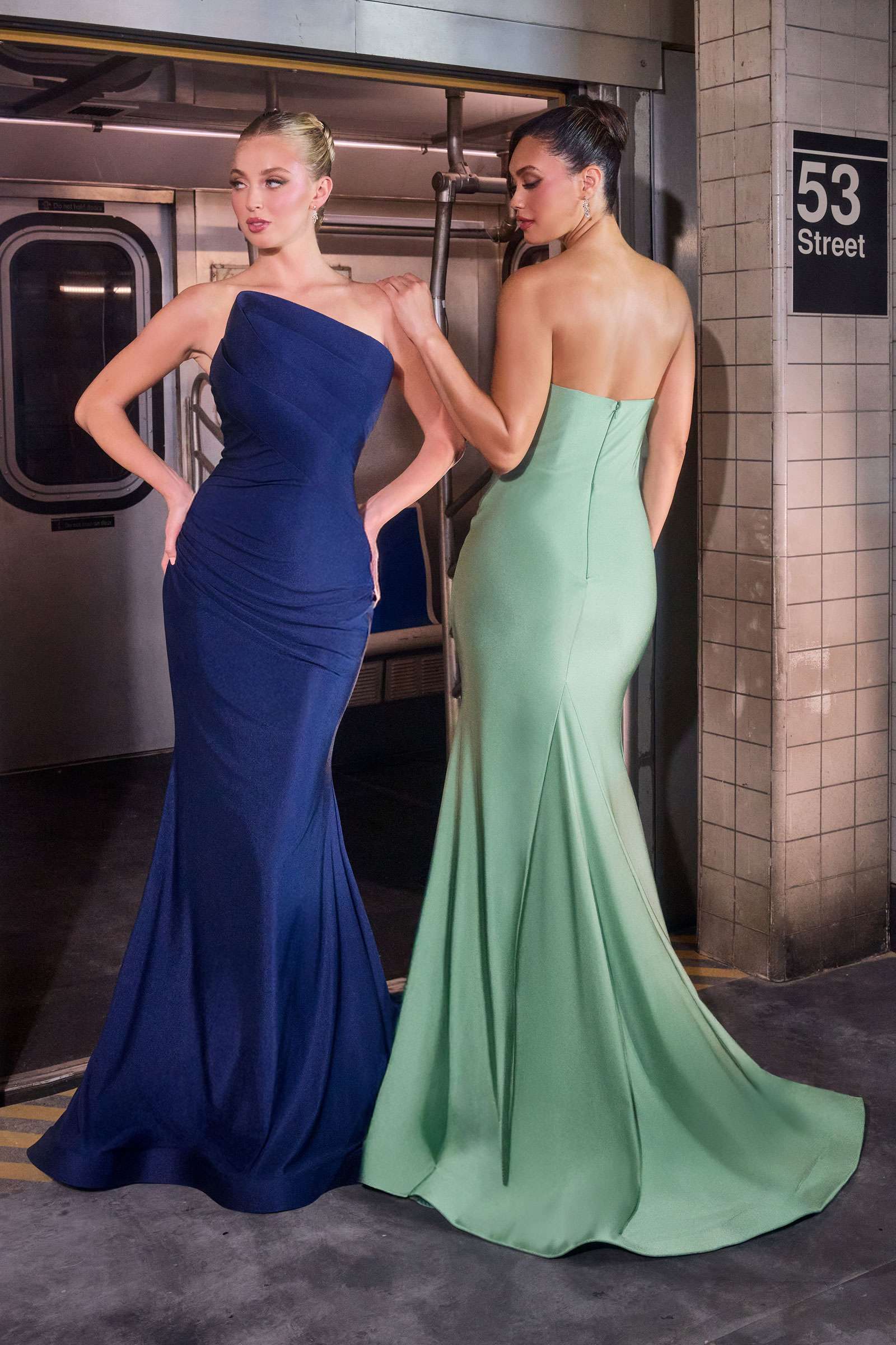 Satin strapless fitted evening dress in navy blue with ruched mermaid silhouette
