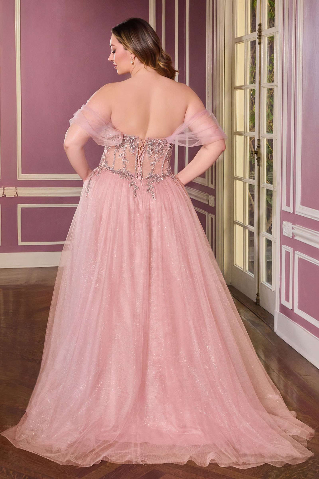 Plus size strapless A-line corset dress in blush tulle with back corset detail