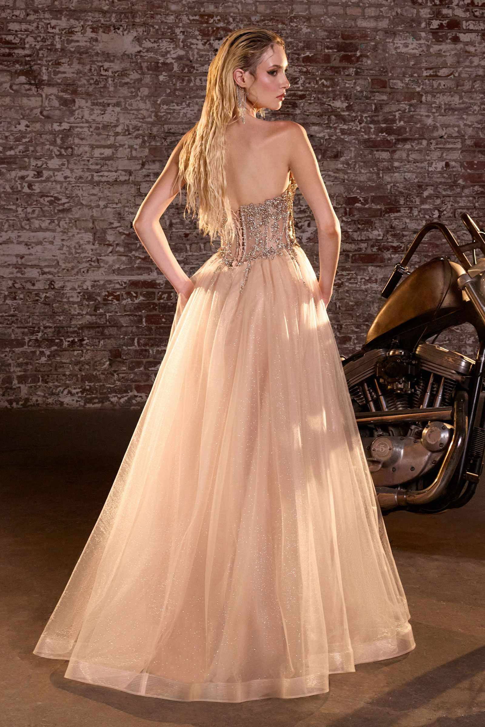 Blush strapless A-line formal dress with sweetheart corset bodice and glitter accents