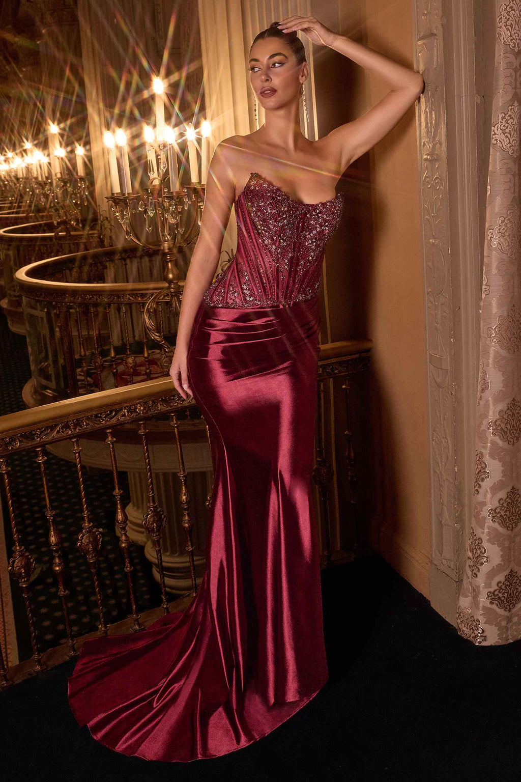 Strapless gown with crystal bodice and burgundy satin skirt, side profile