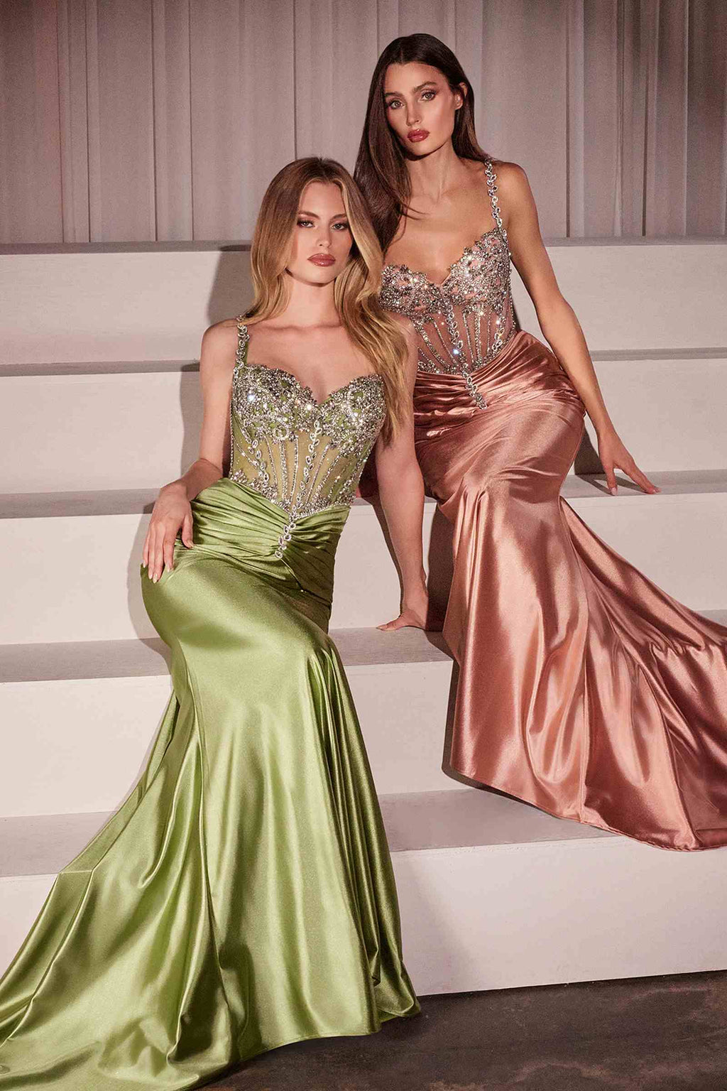 Two satin gowns: green and rose gold, both with crystal-embellished fitted bodices