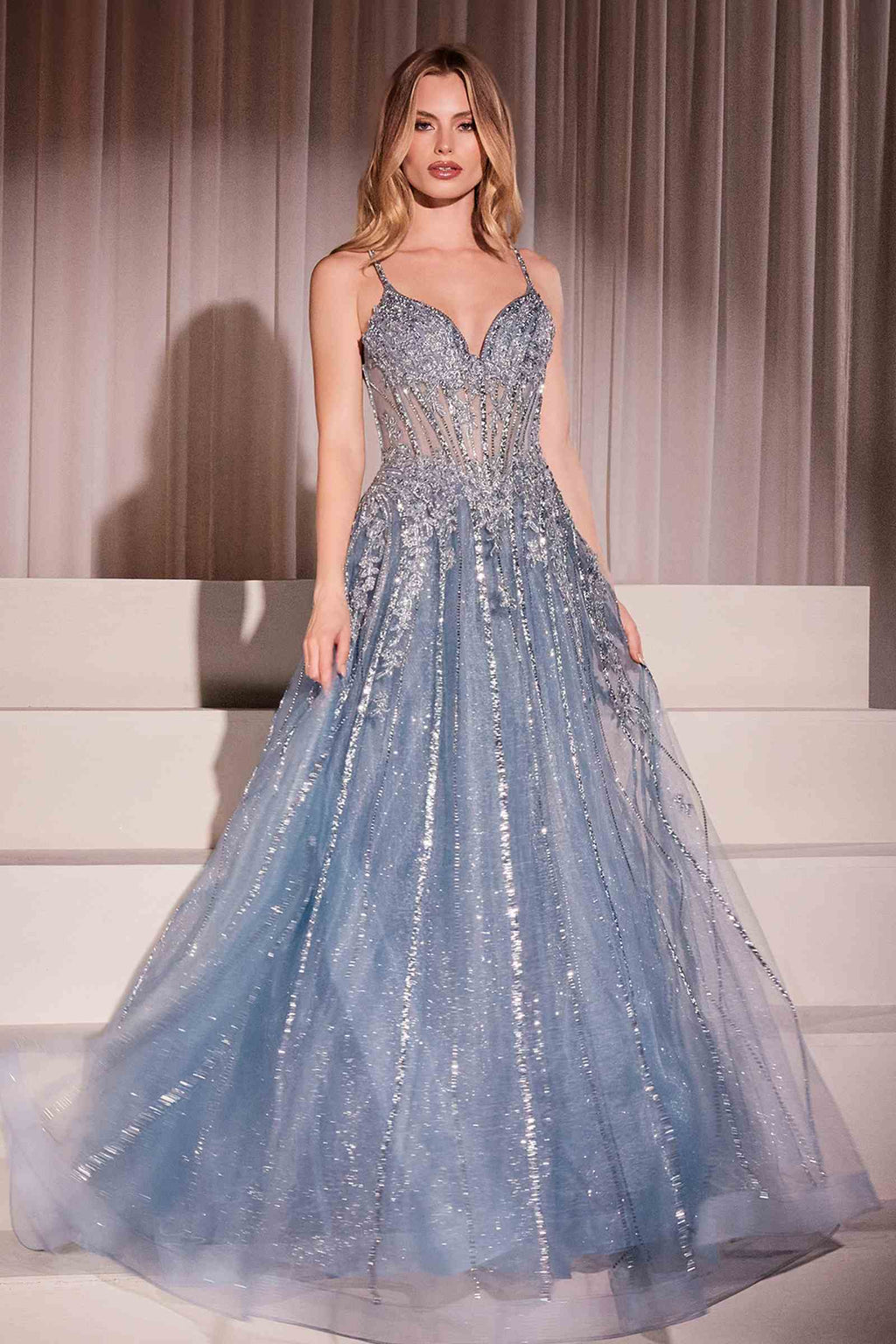 Light blue crystal-embellished A-line tulle gown with sweetheart neckline and sequined bodice