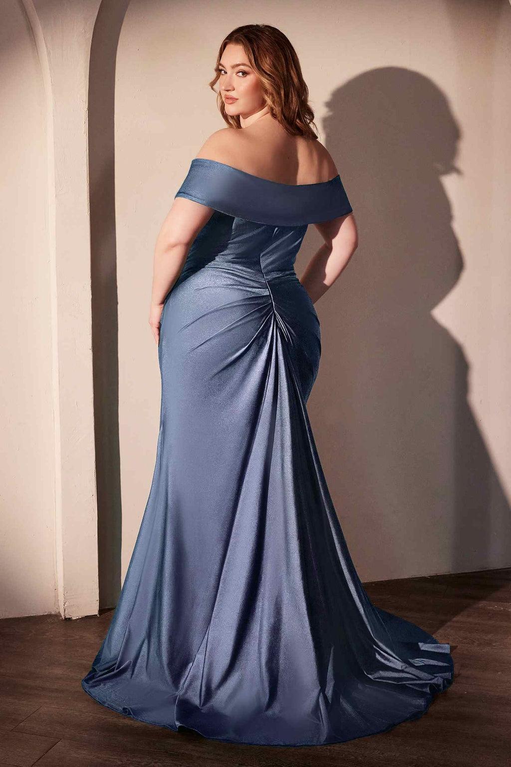 Slate blue off-the-shoulder ruched curve gown with draped skirt and slit