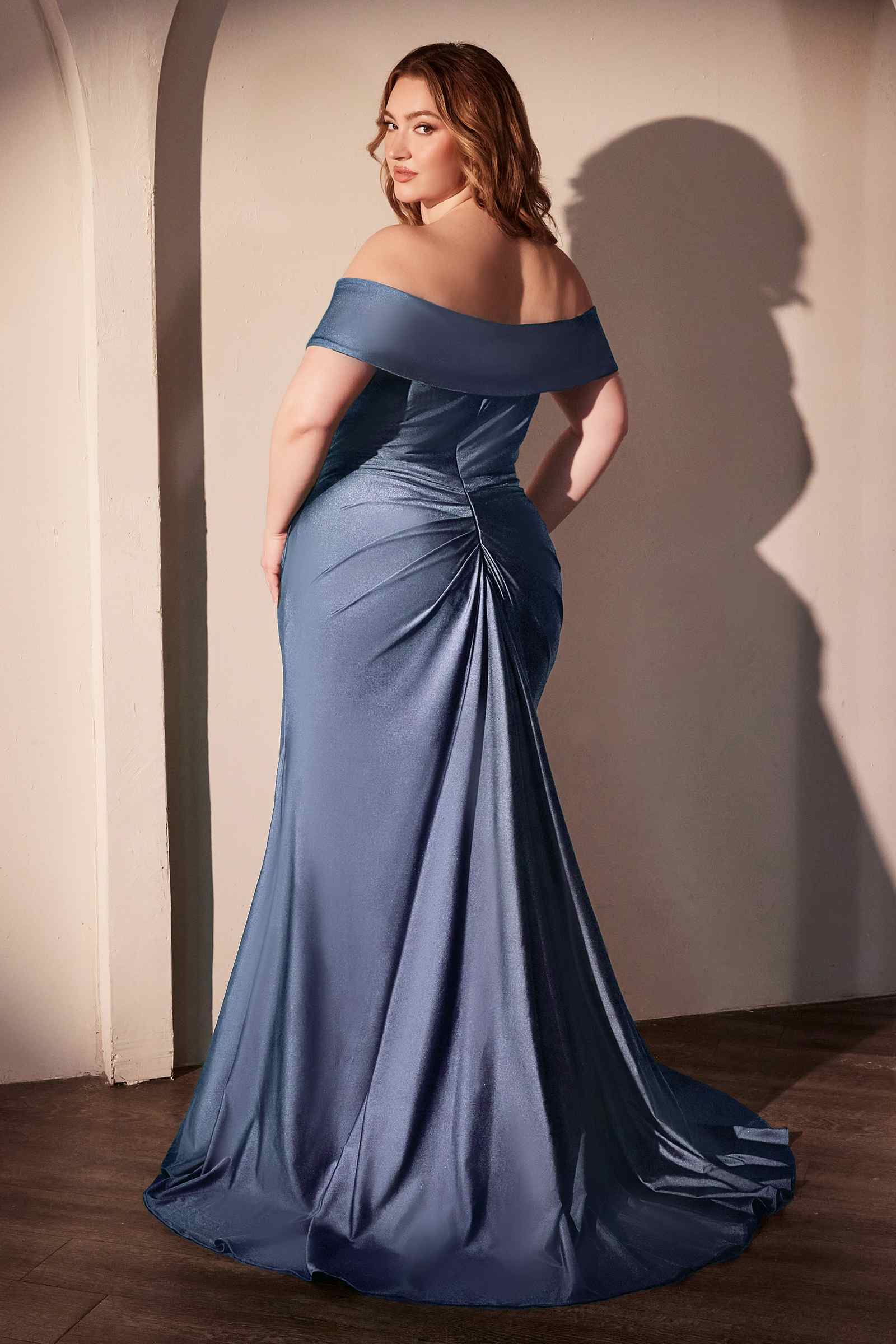 Slate blue off-the-shoulder ruched curve gown with draped skirt and slit