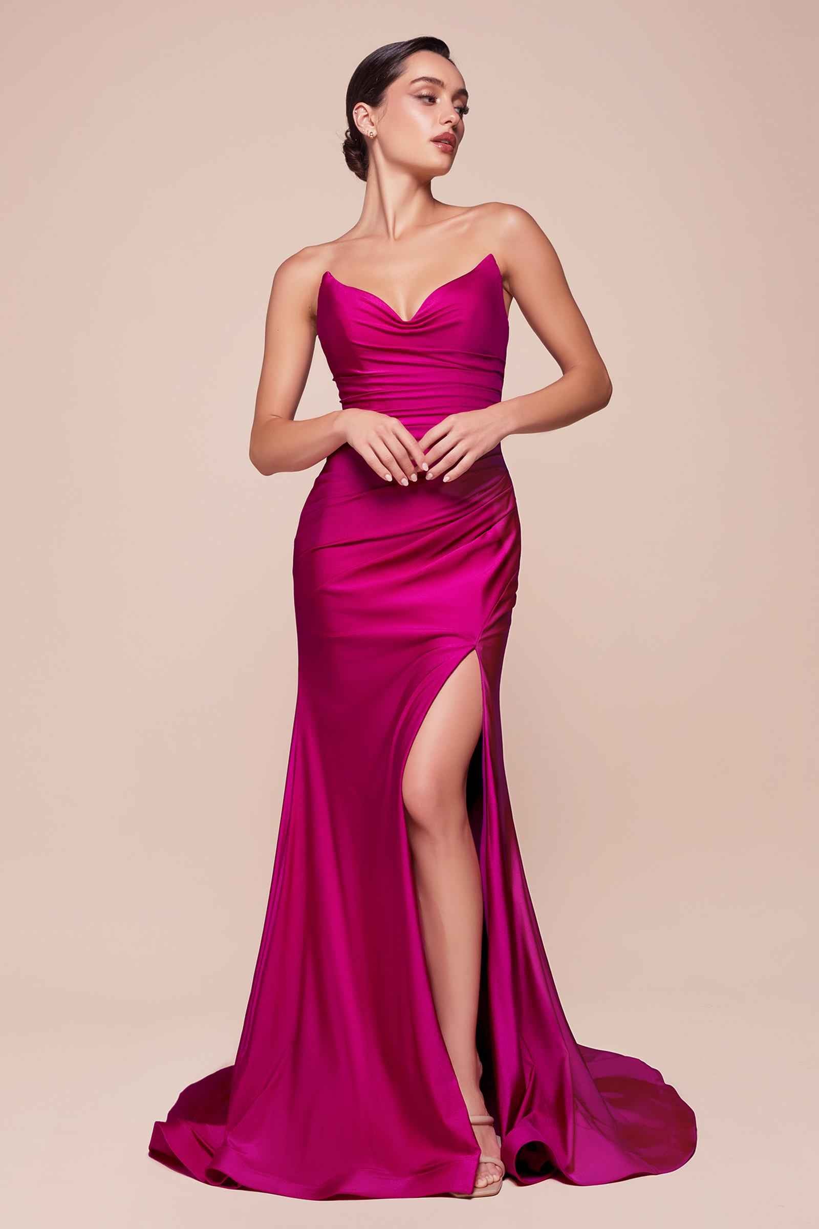 Magenta strapless fitted satin gown with sweetheart neckline and front slit