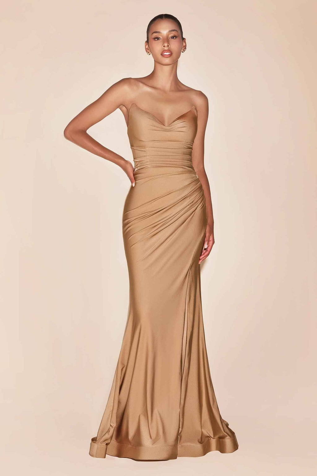 Tan strapless satin fitted gown with sweetheart neckline and ruched bodice