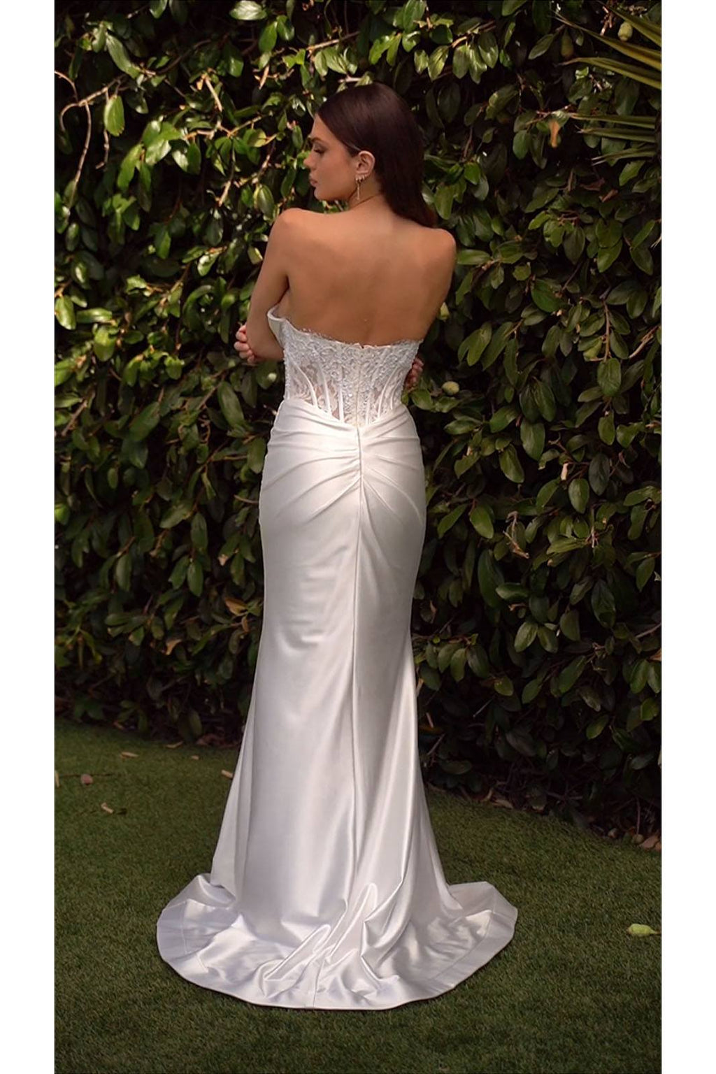 Off-white strapless satin wedding dress, corset back with gathered detail and long train