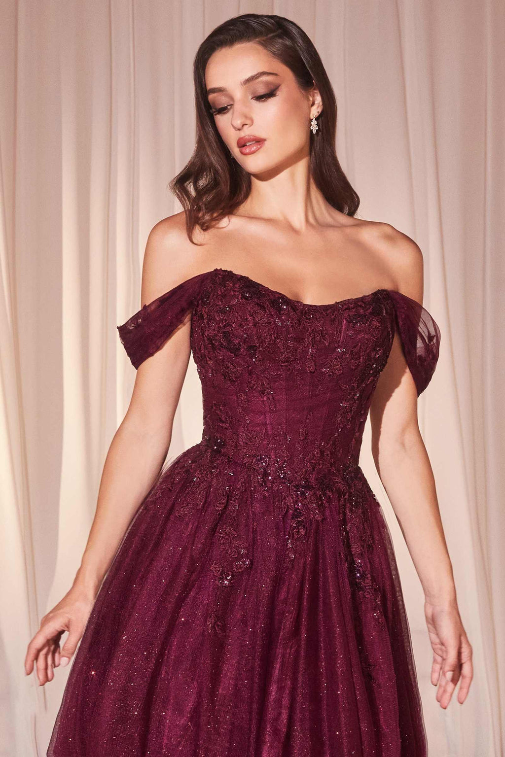 Burgundy glitter off-shoulder ball gown with lace texture and corset waist