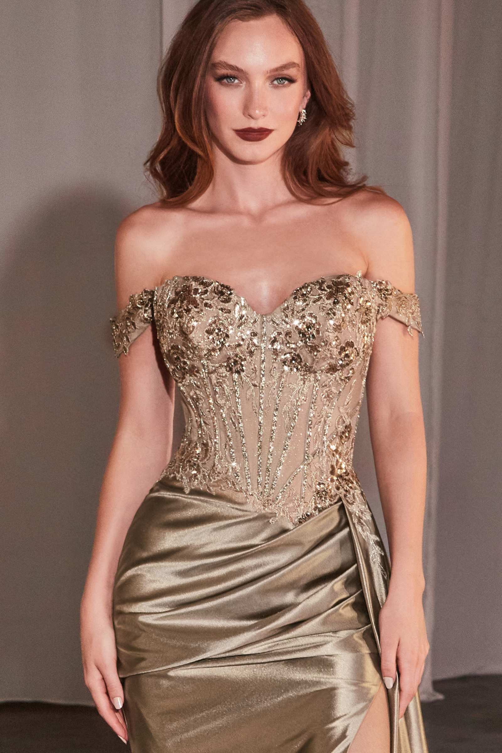 Champagne beaded corset-style bodice with off-shoulder neckline and satin skirt